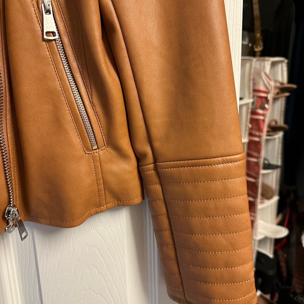 Leather looking jacket.